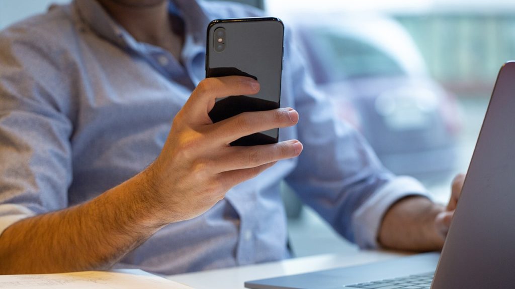 Person Holding iPhone